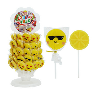 Factory wholesale halal tower packing yellow emote shape fruity flavor lollies candy