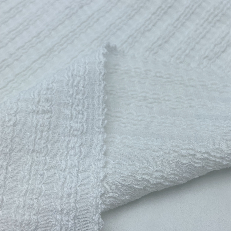 Custom polyester stretch 180GSM warp knitted crinkle seersucker crepe jacquard fabric for dress clothing