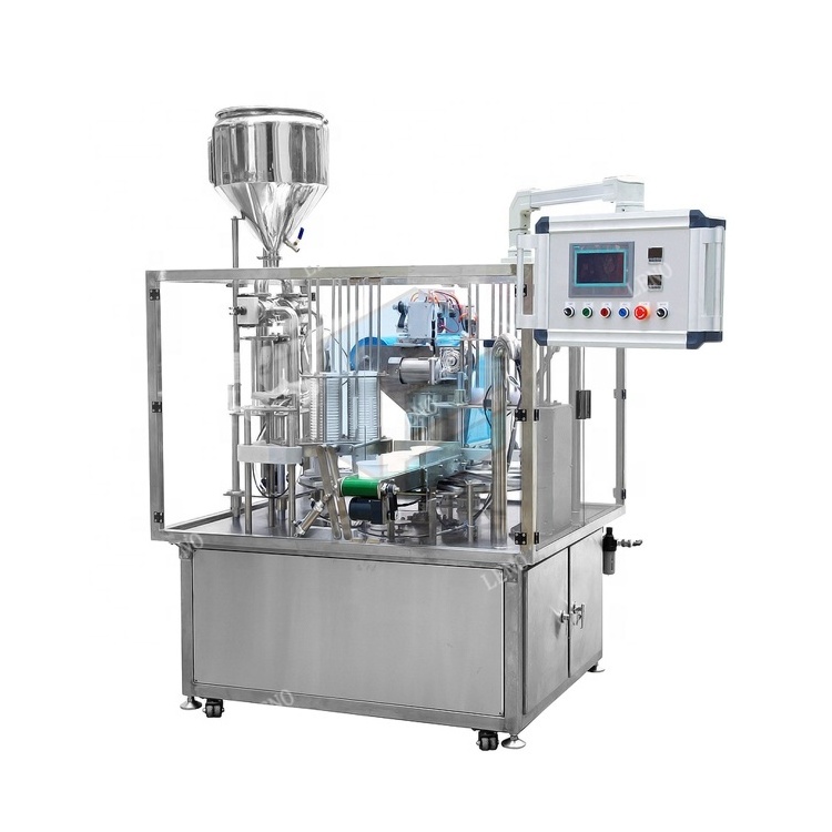 Automatic rotary plastic yogurt mineral water K cup filling sealing packing machine with plexi glass dust cover