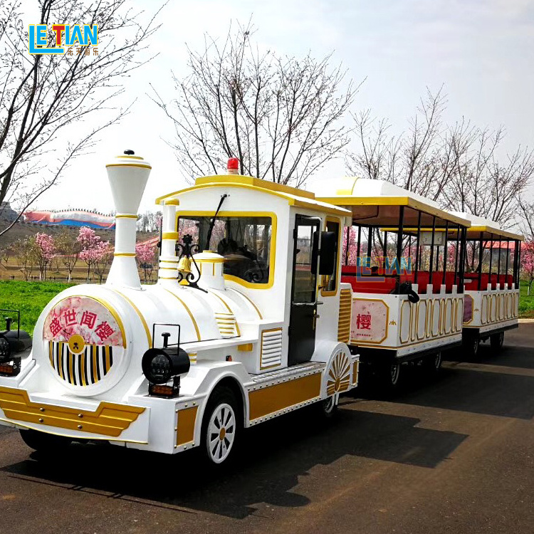 Outdoor trackless trains attractions diesel road train tourist sightseeing train for amusement park family rides