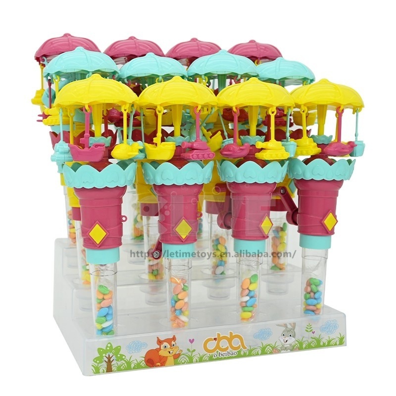 New design novelty light up mini Hand Operated Merry Go Round candy Toy  popular merry go round toy candy for kids