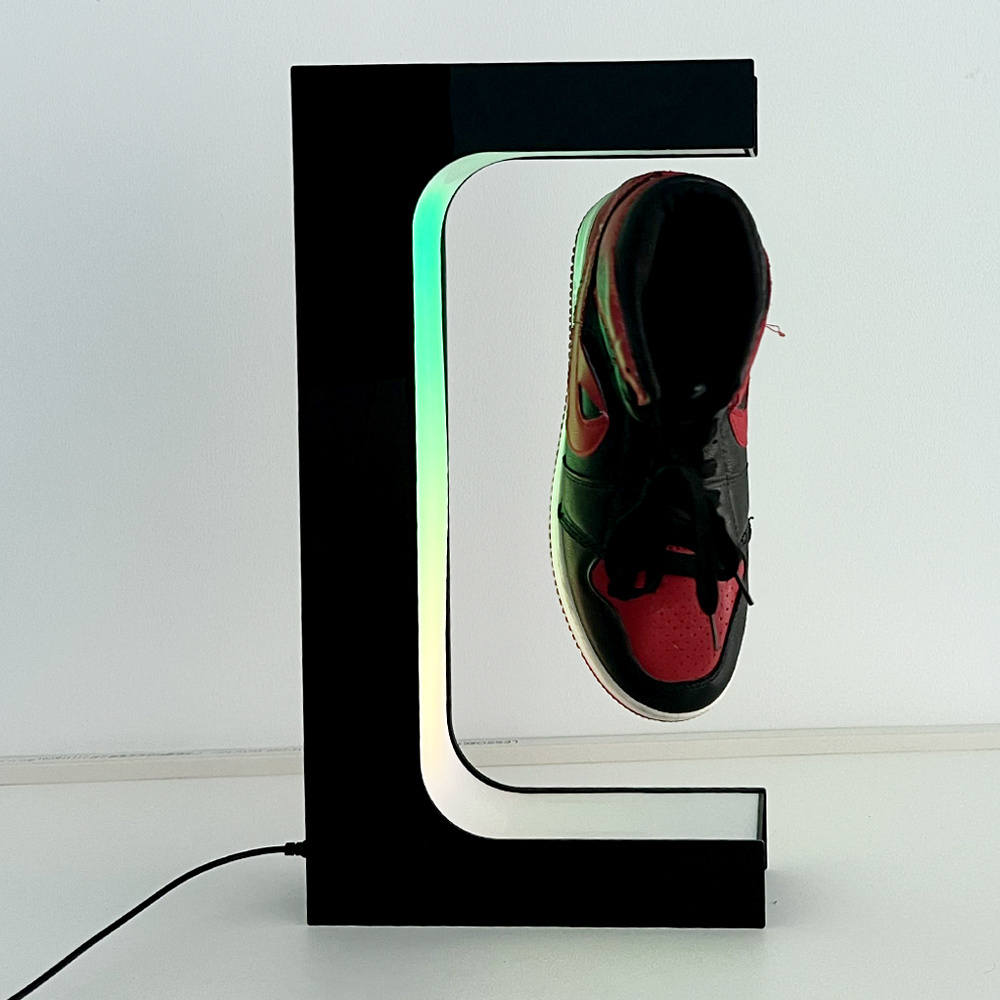 Magnetic levitating floating shoe display with RGB lighting and remote control