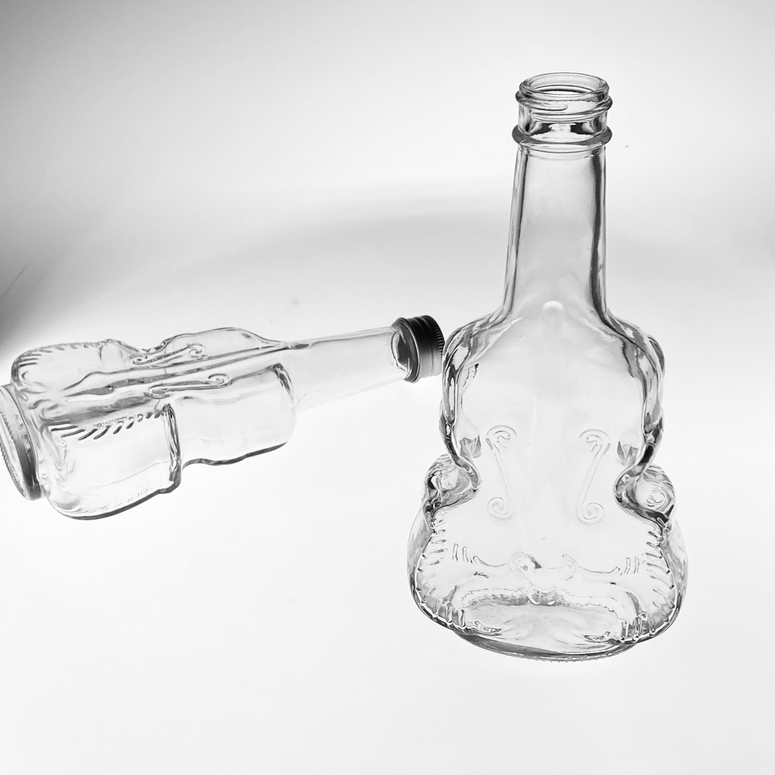 Wholesale violin shaped transparent whisky grape juice glass bottle brandy medicinal Baijiu empty bottle