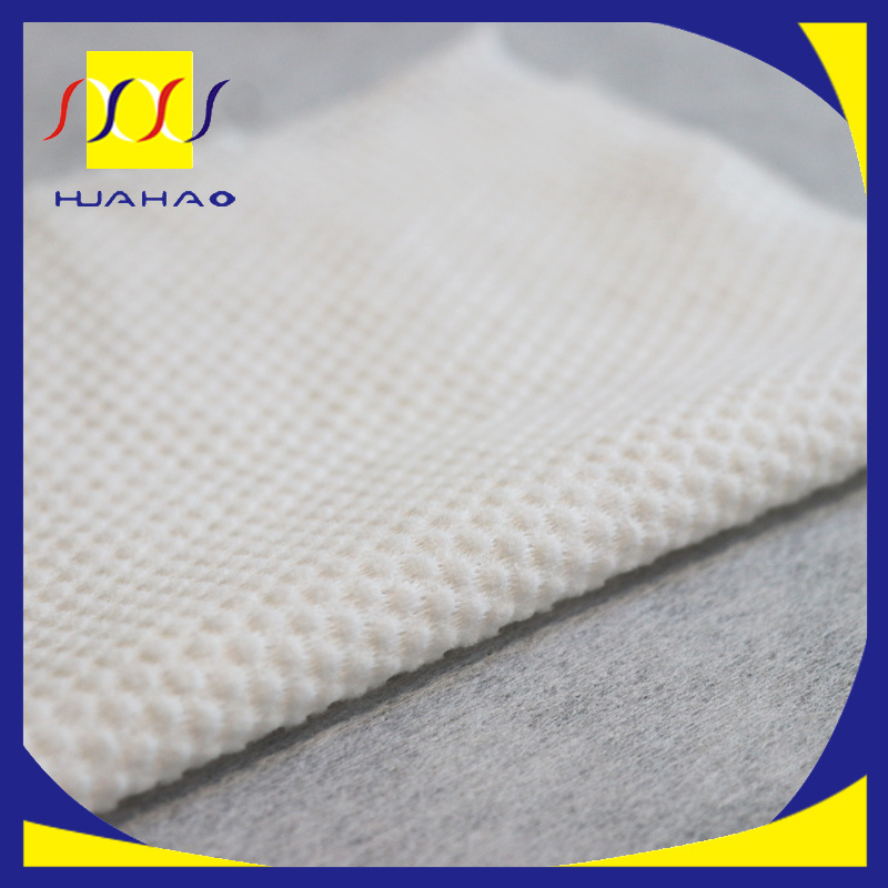 Airlaid Paper Spunlace Non Woven 100% PP Polyethylene Cross Mesh Spunlace Nonwoven Fabric for Hygiene Facial Mask