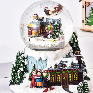 Christmas snow globe resin glass crystal ball on top of blue mountain decoration snow globe with colorful Decor