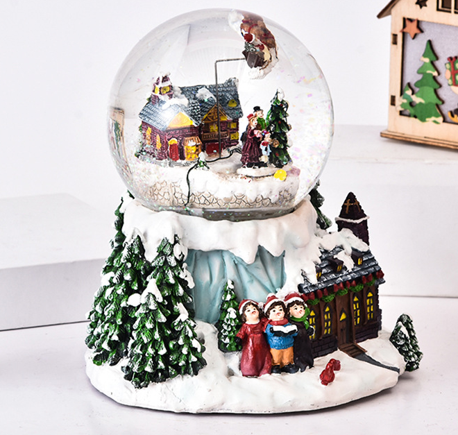 Christmas snow globe resin glass crystal ball on top of blue mountain decoration snow globe with colorful Decor