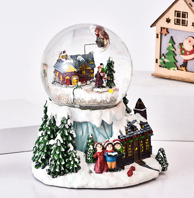 Christmas snow globe resin glass crystal ball on top of blue mountain decoration snow globe with colorful Decor