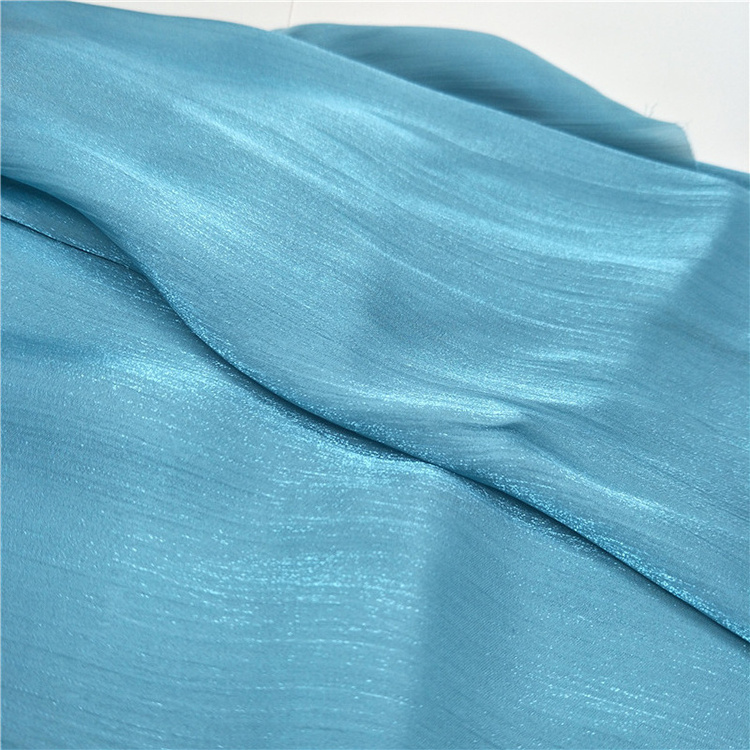 Shiny blue sheer glitter tulle chiffon fabric polyester crinkle crepe GGT crepon shot fabric for wedding evening dress