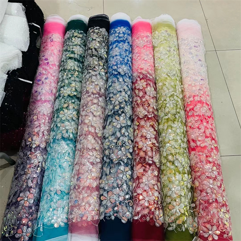 Latest 2023 yellow mesh polyester 3D flower flat embroidery fabrics for cloth dress