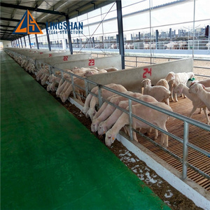 low cost prefabricated steel insulated roof goat sheep shed farming house buildings for sale