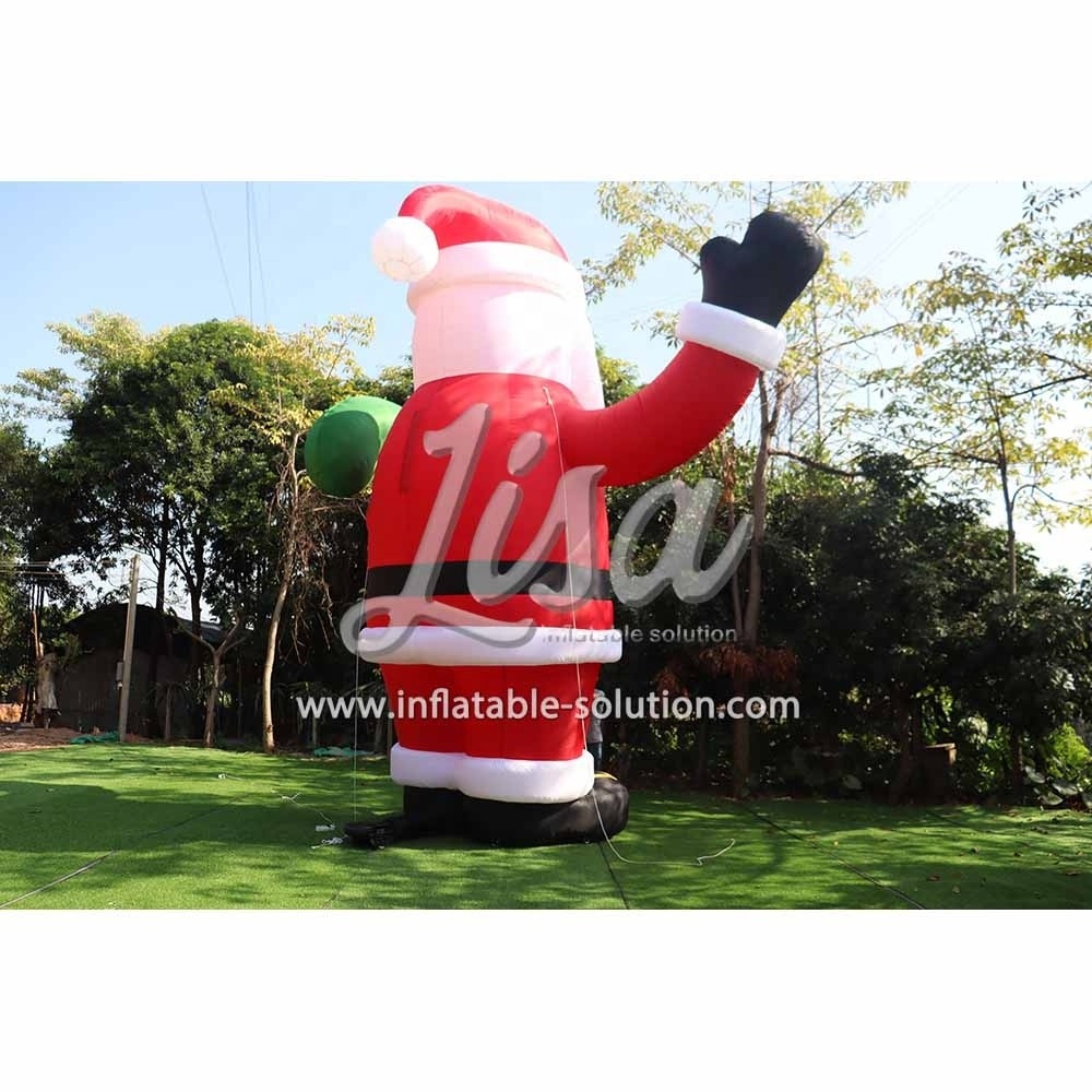 Giant outdoor advertising inflatable santa claus christmas santa claus with a green gift bag for sale