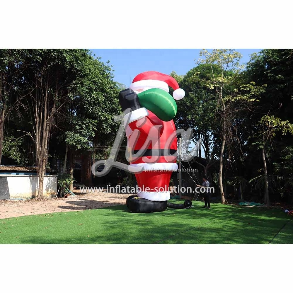 Giant outdoor advertising inflatable santa claus christmas santa claus with a green gift bag for sale