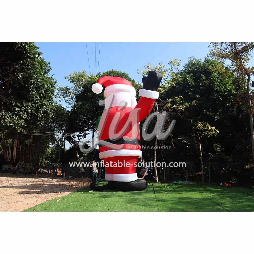 Giant outdoor advertising inflatable santa claus christmas santa claus with a green gift bag for sale