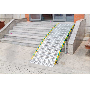 Portable and rolleable aluminum wheel chair ramp for house