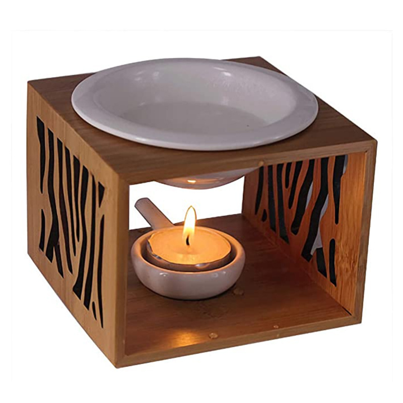 Fragrance candle oil burner in glass candle holder