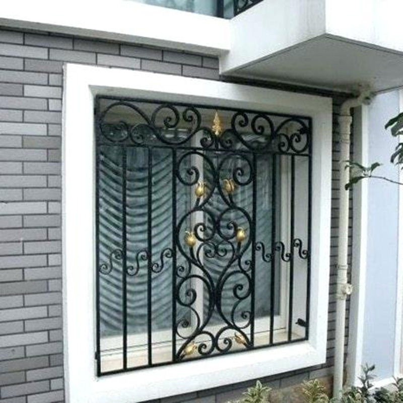 artistic iron window guard design