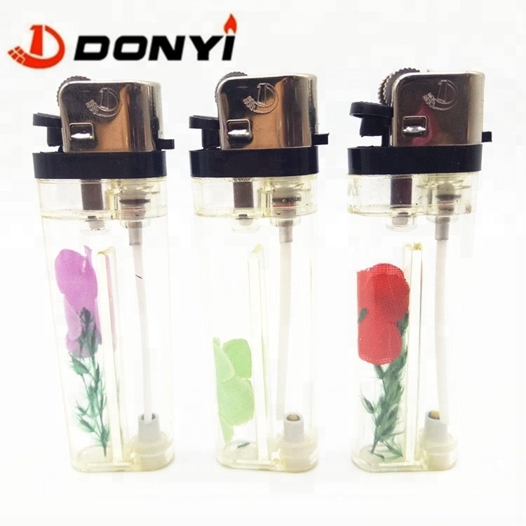 Refillable Flint Wheel Cigarette Lighter, transparent with   flower decoration flower inside,very cheap price