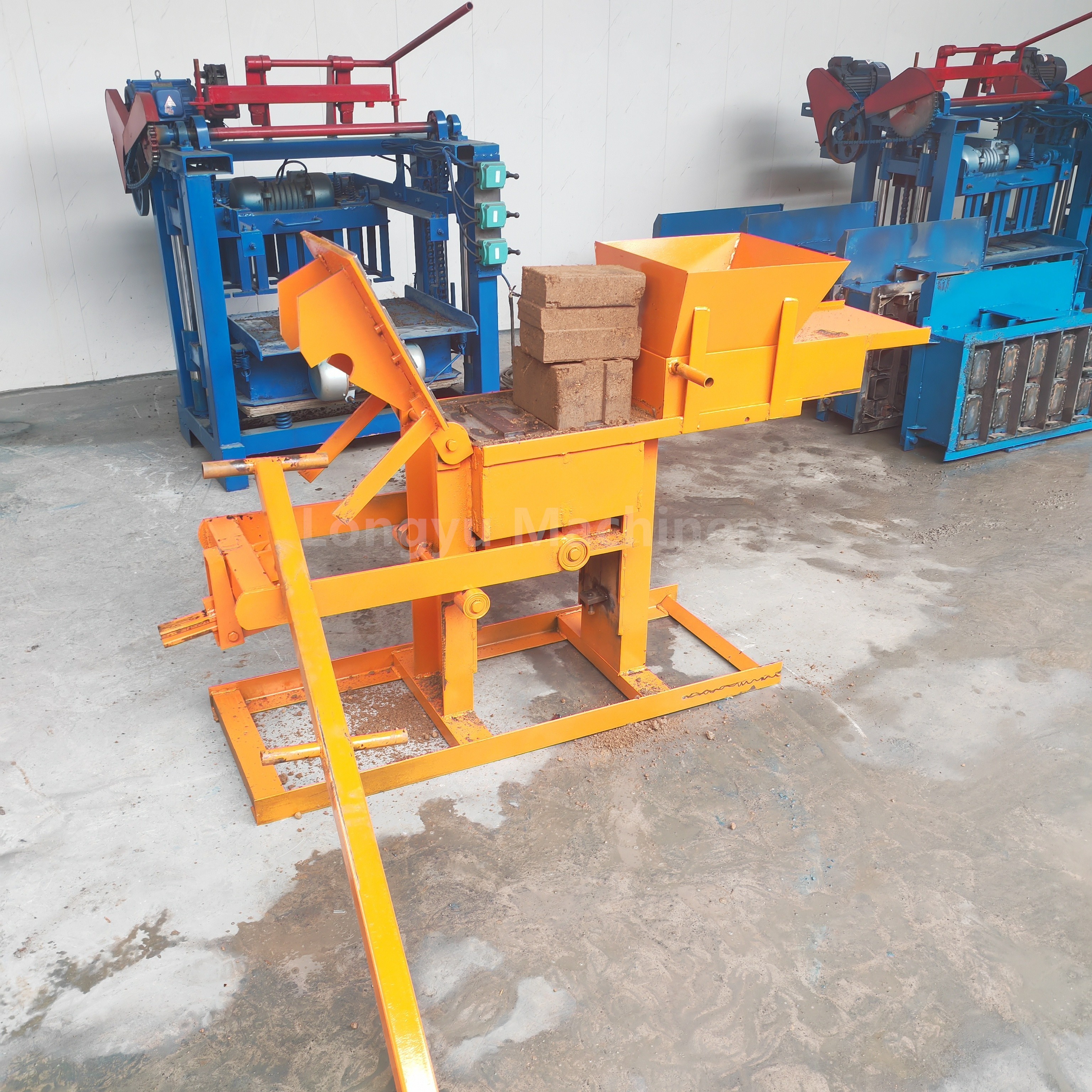 Manual Clay Lego Interlocking Brick Paving Brick Molding Machine Cheap Hand Operated Clay Hollow Brick Molding Machine