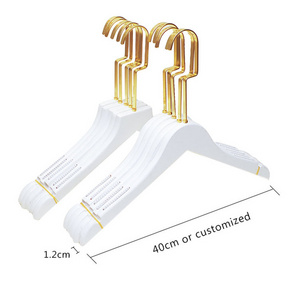 Manufacturer custom luxury wooden swimsuit baby pants clothes garment coat gold hangers with logo rack for clothes