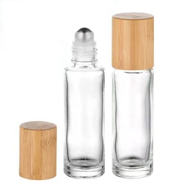 5ml 10ml matte black bottles perfume essential oil clear 10ml bamboo roller roll on glass bottle with metal ball lid for oils