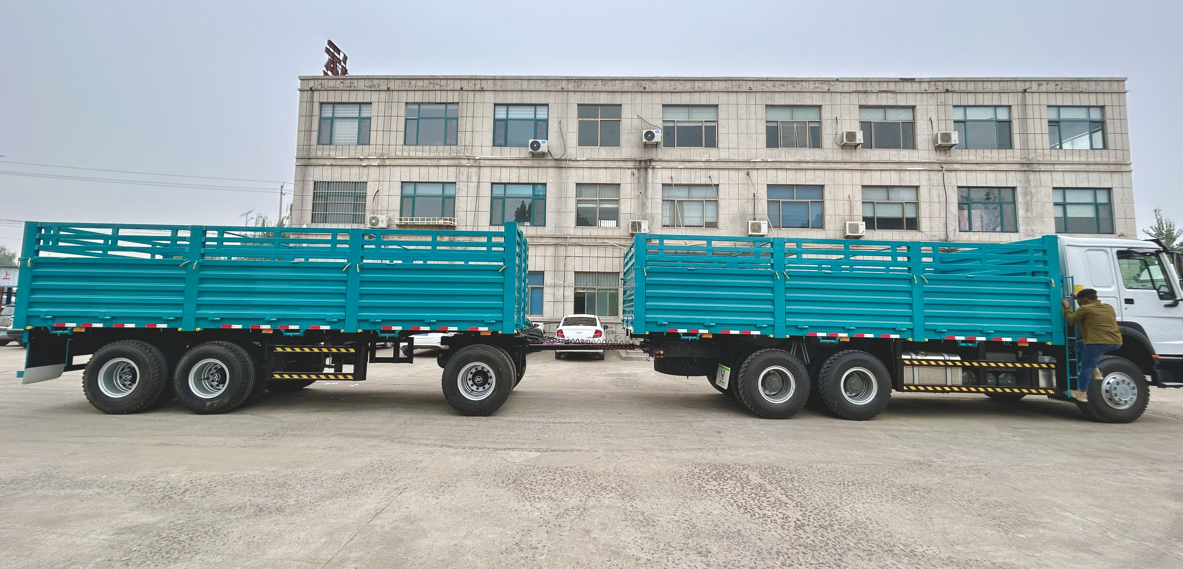 Sinotruck HOWO 400HP Fence Truck Cargo Lorry Dolly Full Side Wall Board Twist Lock Container Ethiopia Truck with Drawbar Trailer