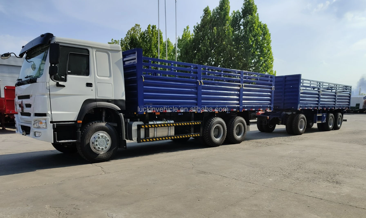 Sinotruck HOWO 400HP Fence Truck Cargo Lorry Dolly Full Side Wall Board Twist Lock Container Ethiopia Truck with Drawbar Trailer