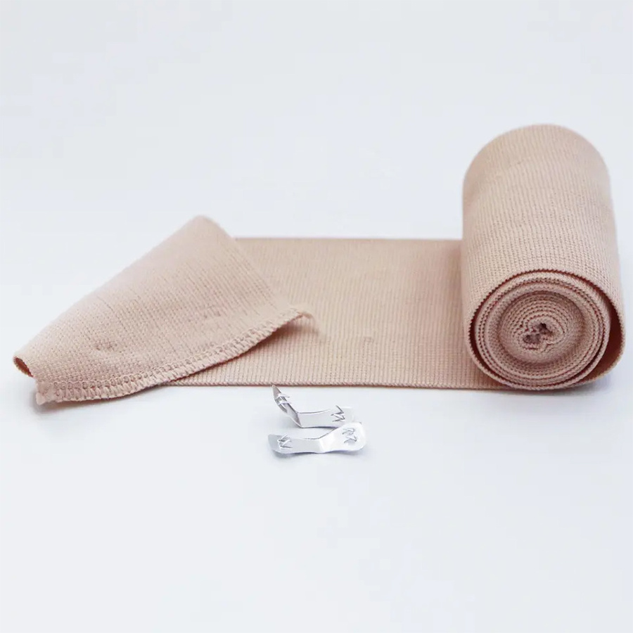 Medical High Elastic Crepe Bandage Fist-Aid Cotton Rubber Elasticity Spandex for Wound Fixation Skin Color with Clips