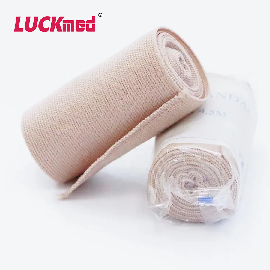 Medical High Elastic Crepe Bandage Fist-Aid Cotton Rubber Elasticity Spandex for Wound Fixation Skin Color with Clips