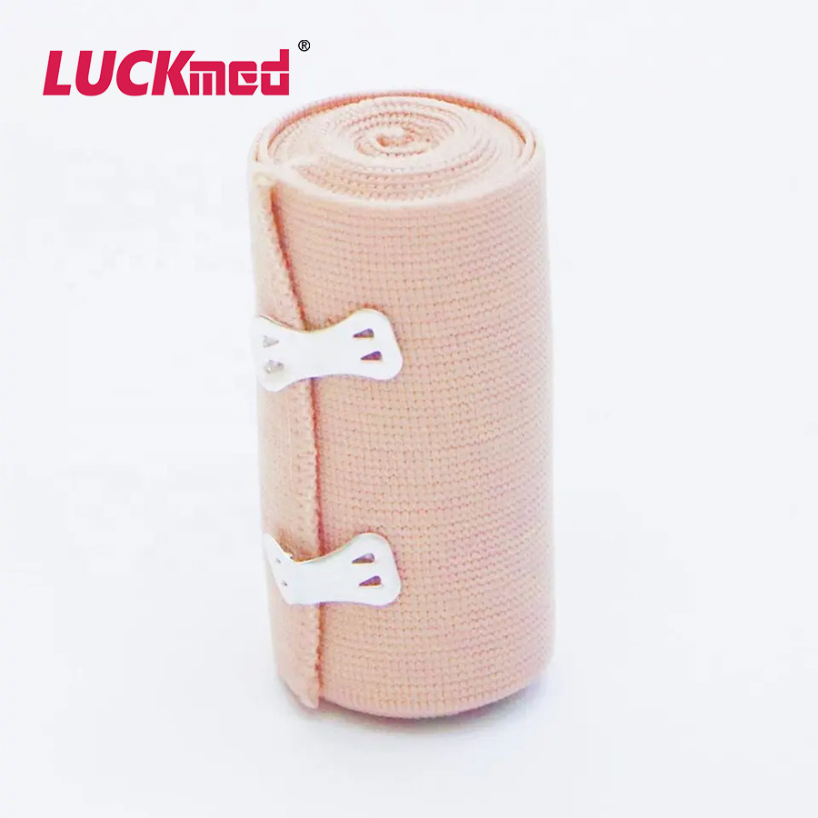 Medical High Elastic Crepe Bandage Fist-Aid Cotton Rubber Elasticity Spandex for Wound Fixation Skin Color with Clips