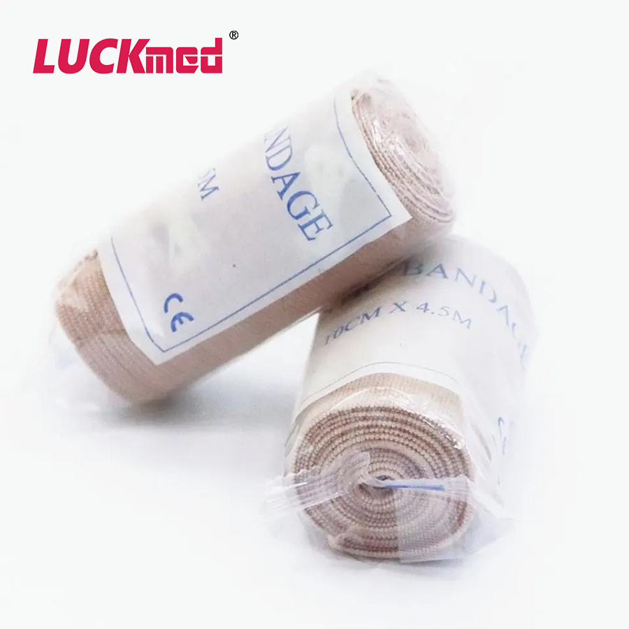 Medical High Elastic Crepe Bandage Fist-Aid Cotton Rubber Elasticity Spandex for Wound Fixation Skin Color with Clips