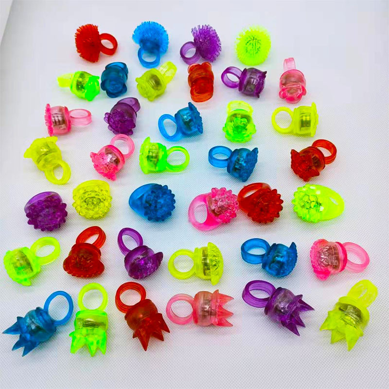 Flashing Colorful LED Light Up Bumpy Jelly Rubber Rings Finger Toys for Parties Favors Raves Concert Shows Gifts