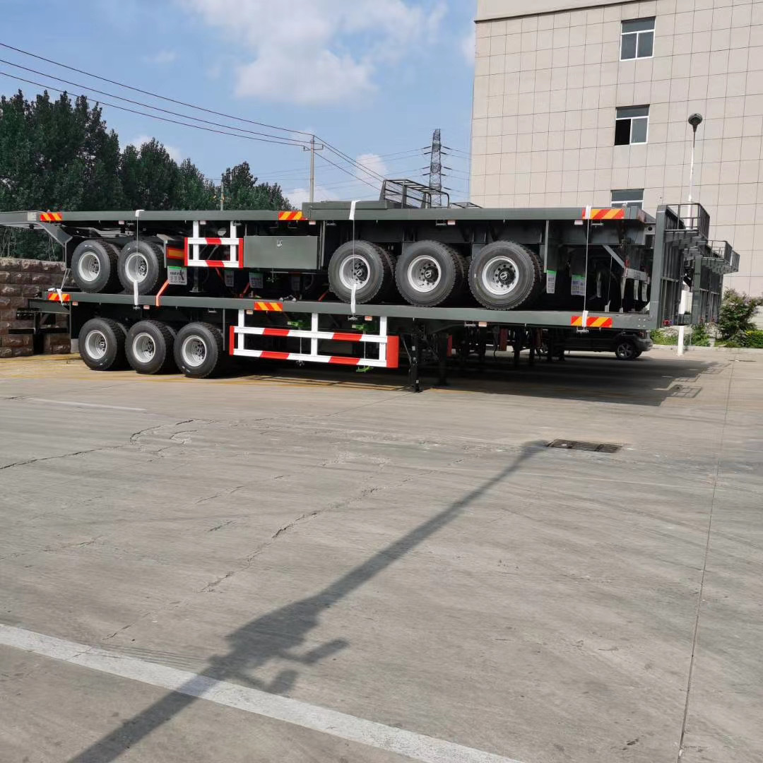 Reliable Performance Steel Semi Truck Trailer Tri-axles 40ft 40T Flatbed Semi Trailer for Container Transporting