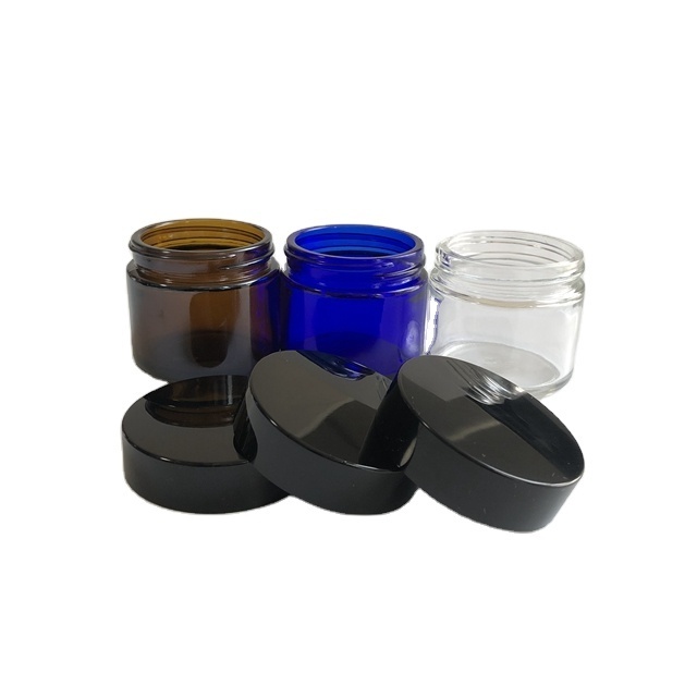 Low price 60ml 2oz Clear Amber Cobalt blue Customized Glass Cream Cosmetic Jars 5g 10g 15g 20g 30g 50g 60g in Large Stock