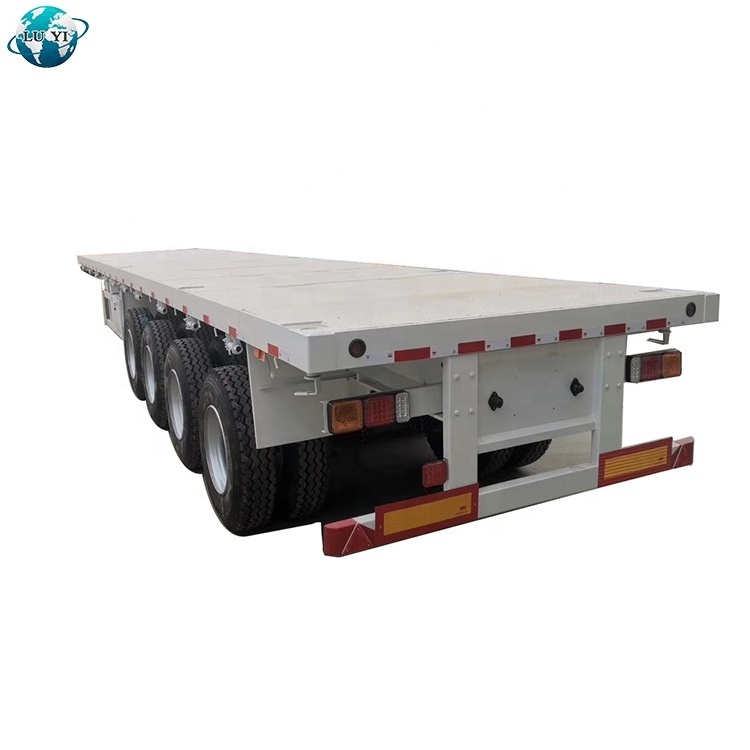 4 axle  80 ton 100 ton low flatbed semi trailer 50 ft 45 ft flatbed trailer 40 feet flatbed truck trailer made in china