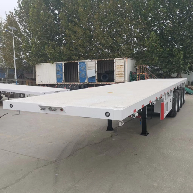 4 axle  80 ton 100 ton low flatbed semi trailer 50 ft 45 ft flatbed trailer 40 feet flatbed truck trailer made in china