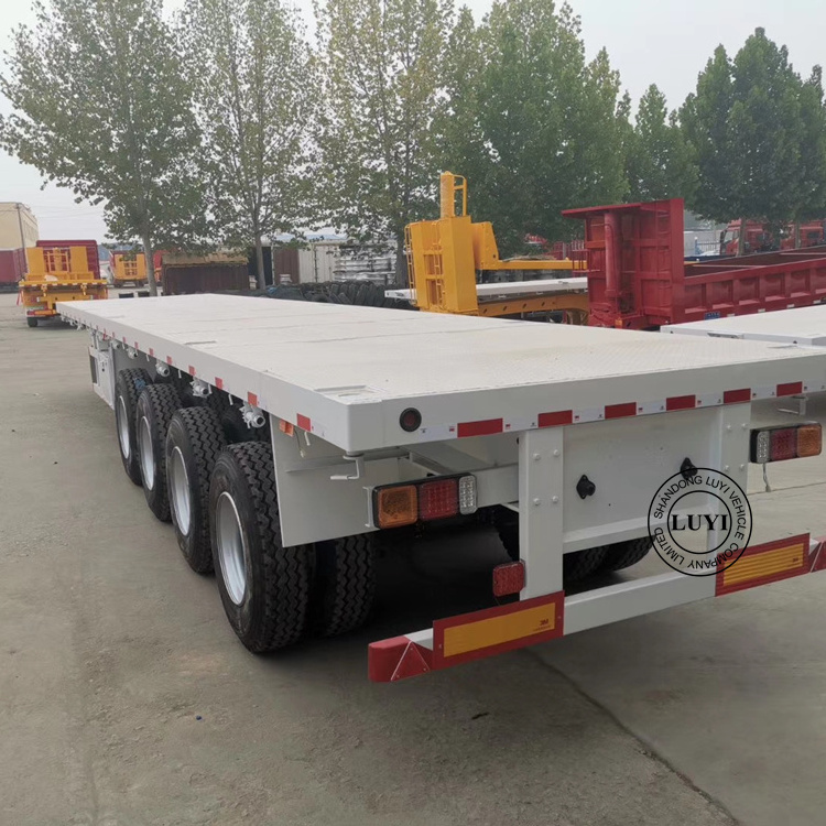 4 axle  80 ton 100 ton low flatbed semi trailer 50 ft 45 ft flatbed trailer 40 feet flatbed truck trailer made in china