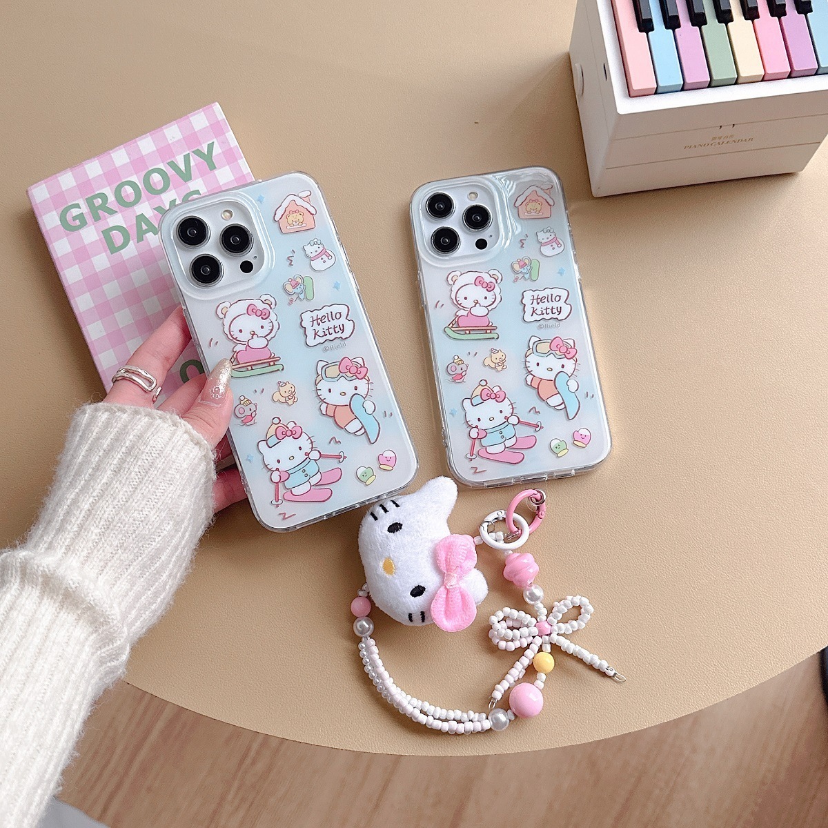 Suitable for iPhone 15 Promax TPU+PC phone case Cute ski Hello Kitty Cartoon Phone Case