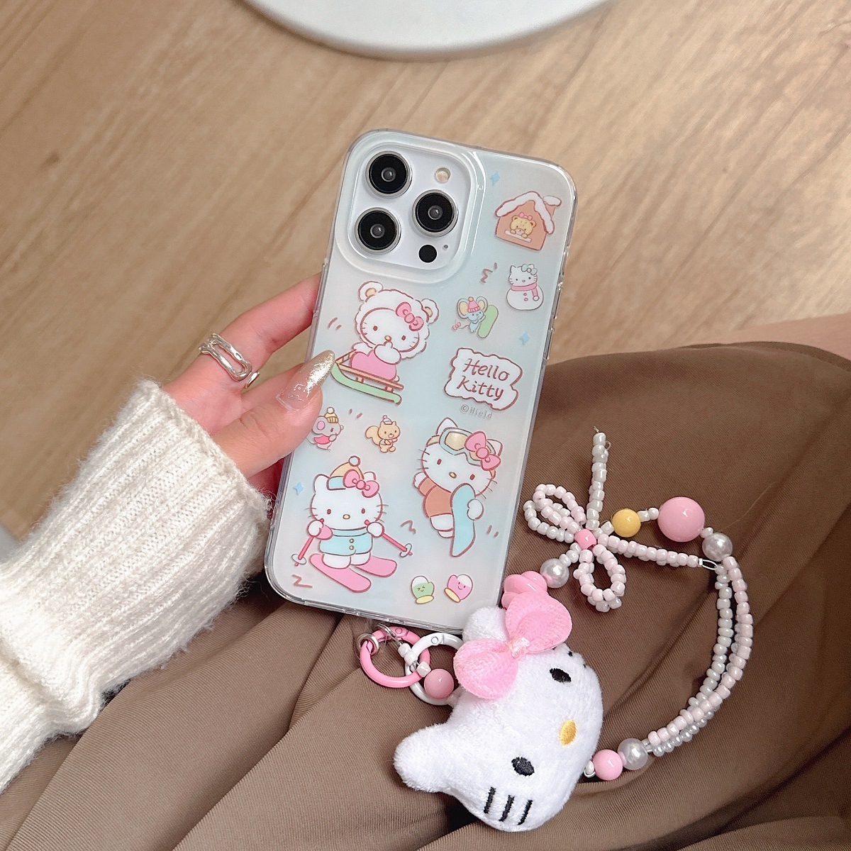 Suitable for iPhone 15 Promax TPU+PC phone case Cute ski Hello Kitty Cartoon Phone Case