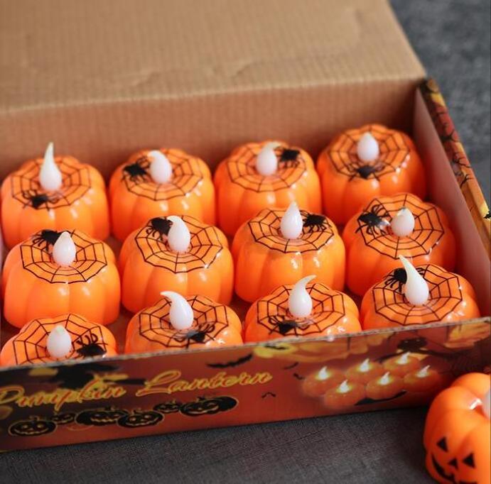 12 Pack Flameless LED Pumpkin candle Halloween Pumpkins Battery Operated Tea Lights Light Up Desktop Adornment for Halloween