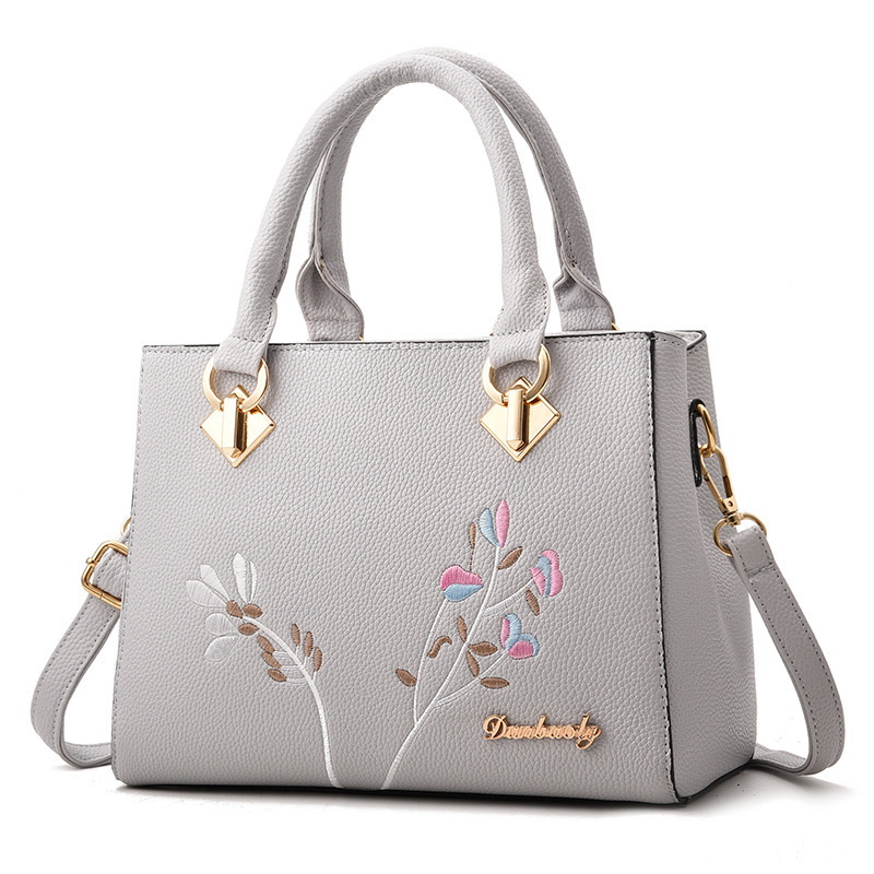 Cheap Price Elegant Office Lady Hard Black Designer Inspired Leather Embroidery Handbag With Flower On Front Of Handbag