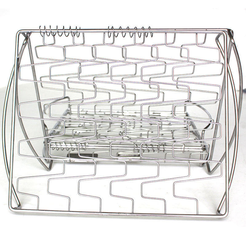 Flexible wire design grill basket adjusts to hold a variety of food sizes and shapes Original Stainless Steel Fish Basket