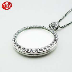 Optical instruments magnifying glass magnifier on a jewelry necklace