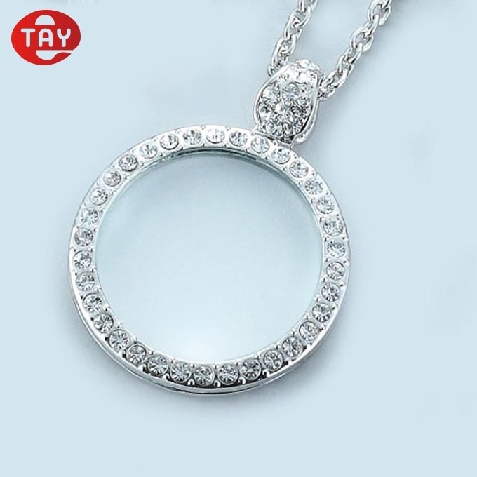 Optical instruments magnifying glass magnifier on a jewelry necklace