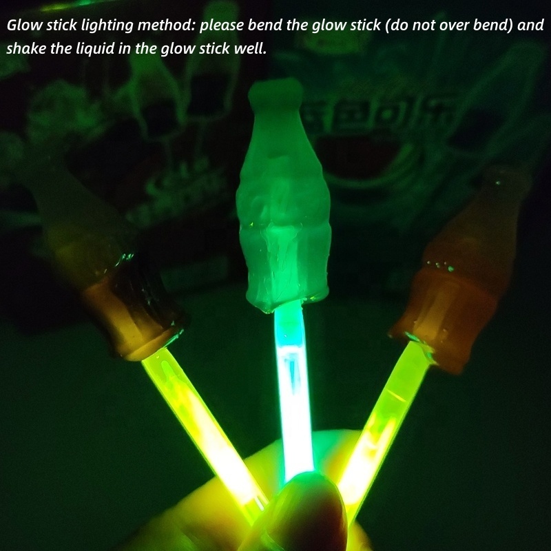 Chinese 10g Creative Florescent Cola Lollipop Candy Glow Stick Lollipop Exotic Snacks in Box for Kids