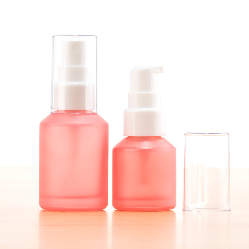 Cosmetics pink frosted glass bottle traveling empty bottle 15ml-100ml spray/pump/screw cap bottle set