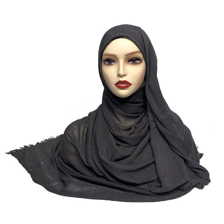 2023 Customized Islamic women's solid color voile modal hijab stretchy knitting bandana cotton scarf tassel shawl wholesalers