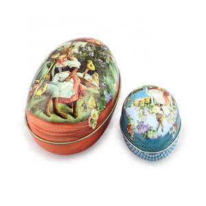 empty egg shaped candy tin box