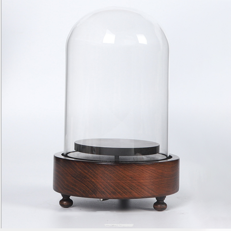 musical glass dome for display