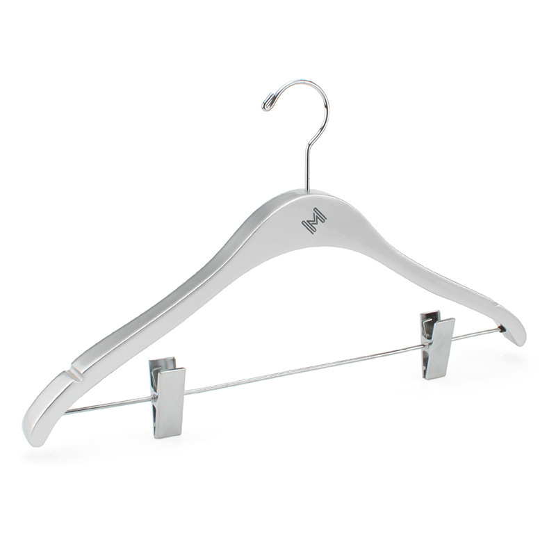 White color wooden hanger for clothes and pants