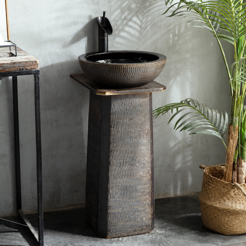 bathroom black square round granite sink with standing natural stone pedestal basin